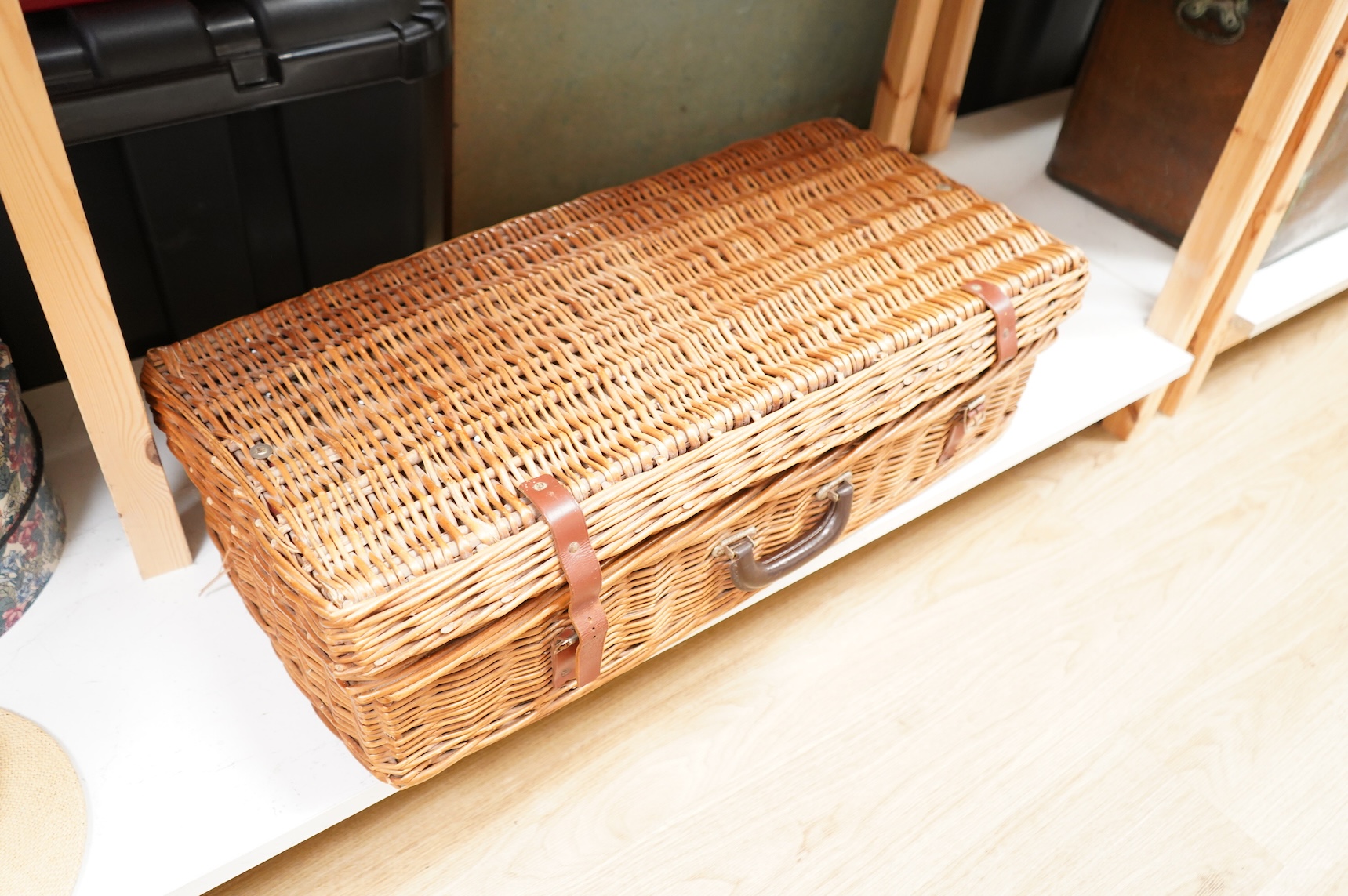 An Asprey wicker picnic basket, fully fitted with contents
